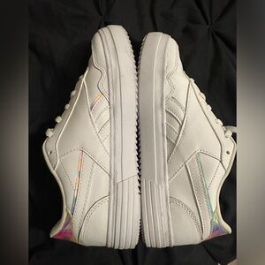 White Reebok Mermaid Metallic detailing. Gently used. USA size 7.5 women’s.